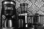 The automated coffee machine vs the manual with grinder in between